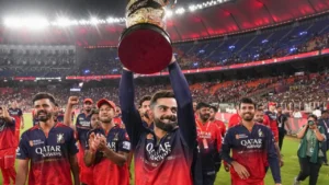 Virat kohli celebrating after winning ipl 2026 final match for rcb