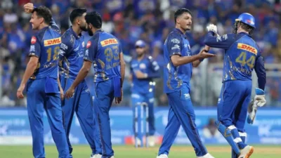 Mumbai indians and nike logo representing the multi-year kit partnership for ipl 2027.